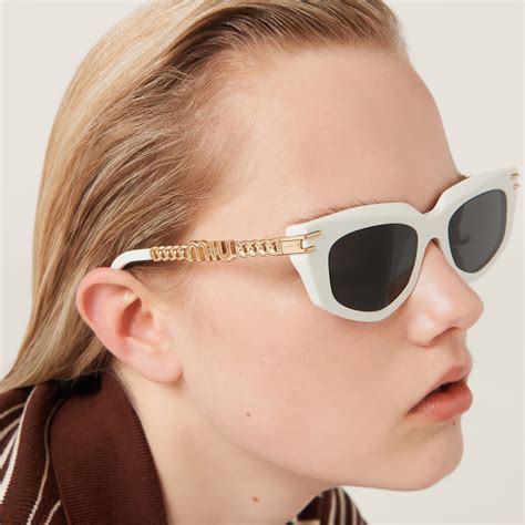 miu miu embellished sunglasses|Slate Gray Lenses Miu Miu Logo Sunglasses .